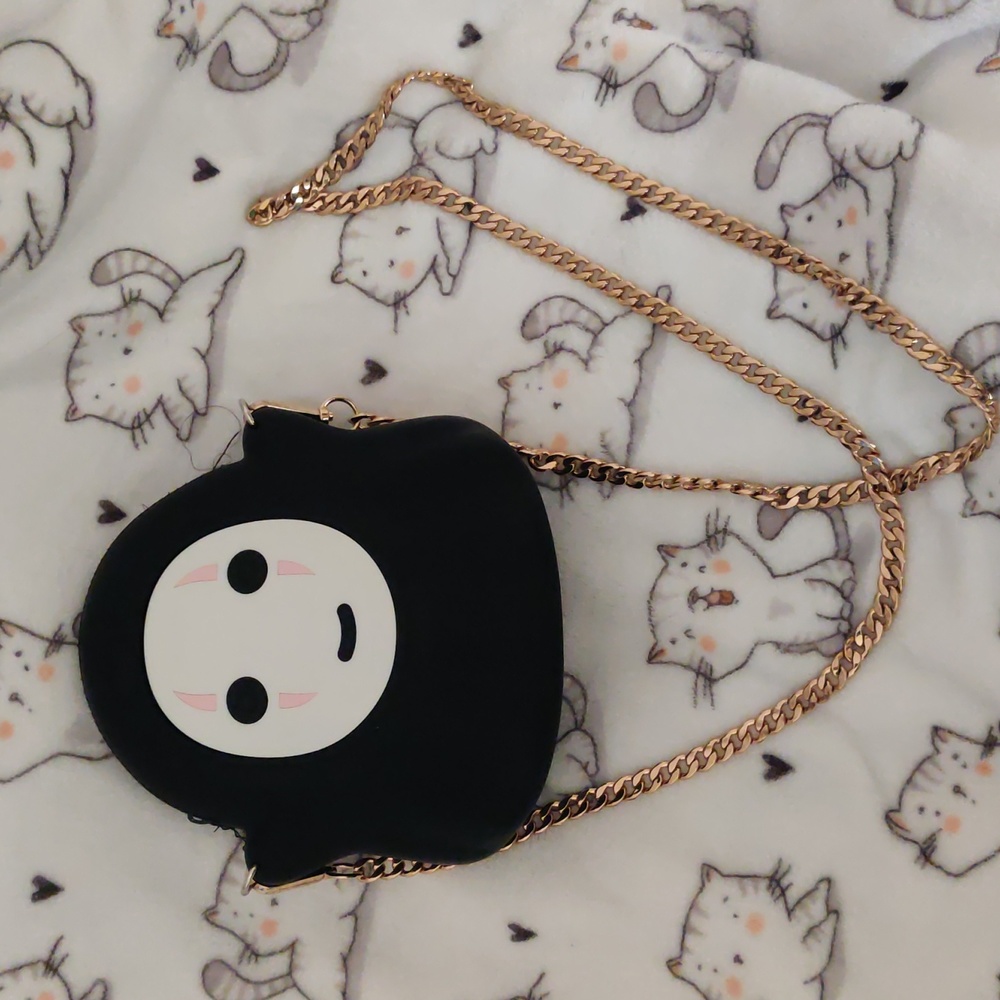 No face crossbody bag